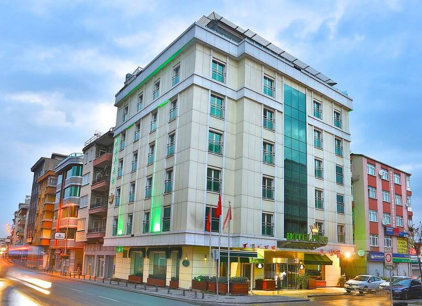 Boutique Princess Hotel in Istanbul, corner exterior of a multi-story hotel building at dusk