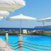Castello Antico Hotel in Gytheio with outdoor pool, sun loungers and sea view