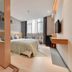 Shang Yuan Hotel Shang Xia Jiu Branch Guangzhou guest room with bed, window seating, and bathroom area