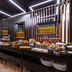 Leonardo Boutique Hotel Krakow Old Town buffet breakfast area with pastries and seating in Krakow