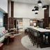 Hampton Inn & Suites El Paso-East lobby dining area with long table and modern pendant lights