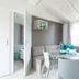 Del Garda Village and Camping in Peschiera del Garda, bright compact dining nook with window bench seating