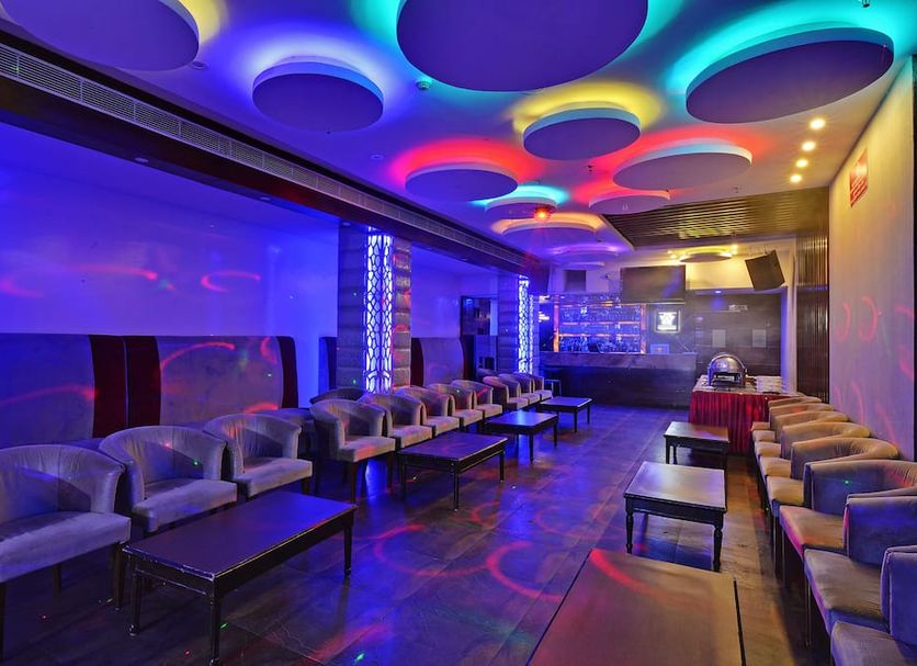 Hotel City Heart Premium in Chandigarh lounge with colorful ceiling lights and seating area