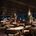 Grand Mercure Nasu Highlands Resort & Spa lounge with round tables, armchairs and large windows in Nasu