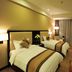 Shenyang Neu International Hotel in Shenyang room with two twin beds and floor-to-ceiling curtains