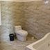 Boutique Hotel Argo bathroom in Kutaisi with marble tile, toilet, sink, towel rack and bathtub