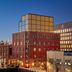 Wythe Hotel in Brooklyn with rooftop views of the Manhattan skyline at dusk