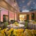 Hotel Nikko Tsukuba in Tsukuba banquet room with round tables, yellow floral centerpieces, and city view