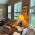 Tropical Resort & Marina on Lake Beresford in DeLand: cozy lounge with seating and large windows