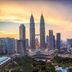 Sindbad Hotel in Kuala Lumpur with Petronas Towers skyline at sunset