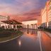 Universal Endless Summer Resort Dockside in Orlando with sunset-reflecting drive and landscaped entrance