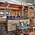 Tawas Bay Beach Resort in East Tawas lounge bar and dining area with tables and seating