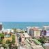 Many Holiday The Base Condo Pattaya with city and ocean view from a high-rise balcony