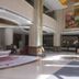 Golden Ray International Hotel in Yichang lobby with marble floors, large columns and a decorative fountain
