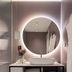 1.75 Paris La Source bathroom vanity with round backlit mirror and white vessel sink in Paris