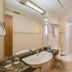 Blue Tree Towers Caxias do Sul bathroom with vanity sink, toilet, and glass shower