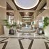 Hilton Suites Jabal Omar Makkah lobby in Mecca with grand chandelier and central fountain