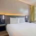 Studio 6 San Antonio, Tx - Medical Center room with queen bed and window view in San Antonio