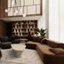 Metcalfe Montreal lobby with modern seating, tall windows and a reception desk in Montreal