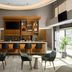 SpringHill Suites by Marriott Seattle Issaquah lobby bar with stools, lounge chairs and large windows