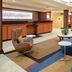 Fairfield Inn & Suites by Marriott Seymour lobby with curved blue seating and front desk