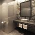 Kuala Lumpur International Hotel bathroom with toilet, glass shower, vessel sink, and mirror