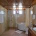 Vinh Suong Seaside Phan Thiet bathroom with glass shower, soaking tub, sink and toilet