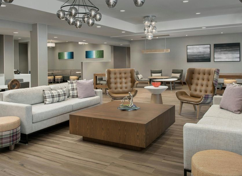 Residence Inn by Marriott Doral Mall Area lobby with modern seating and coffee tables in Doral
