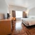 Caritas Oswald Cheung International House Hong Kong guest room with twin beds and desk