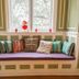 Fairfield Manor Bed and Breakfast in Shreveport, cozy window seat with colorful pillows