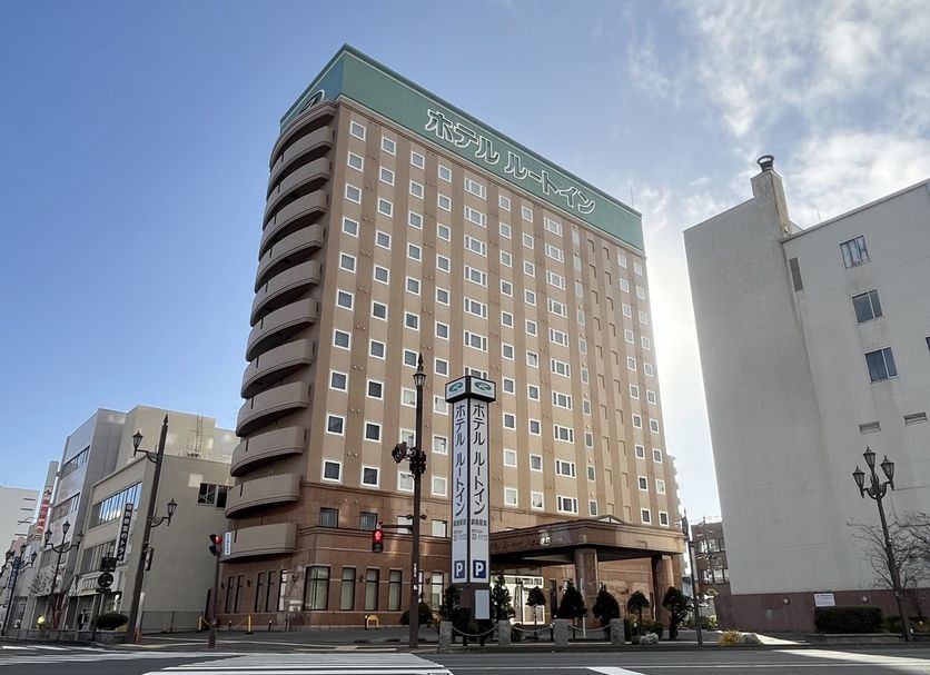 Hotel Route-Inn Kushiro Ekimae in Kushiro, tall city hotel exterior with entrance and street view