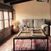 Posada Mayor de Migueloa in Laguardia, cozy lounge with sofas and a glass coffee table