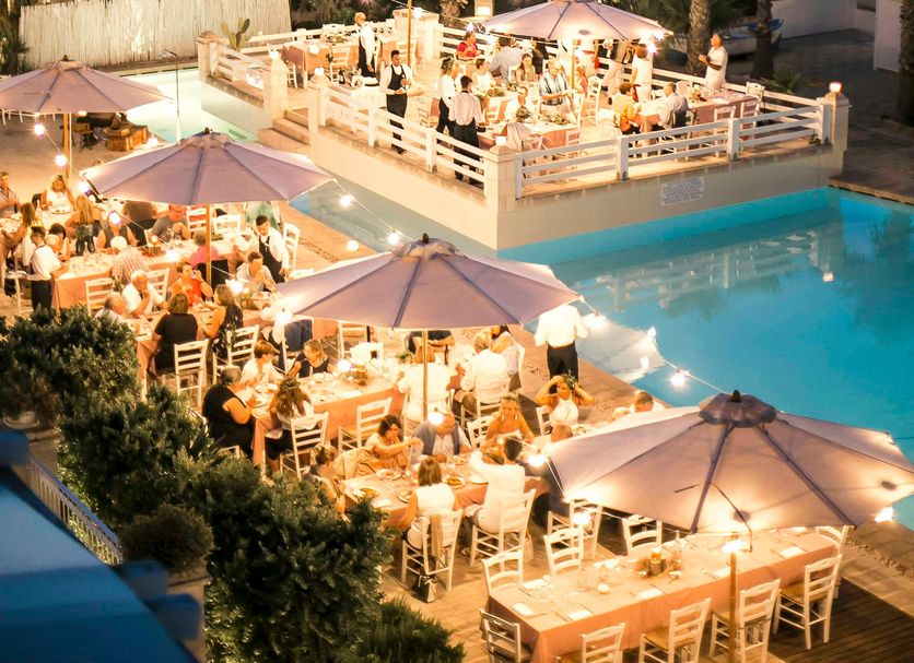Canne Bianche Lifestyle Hotel in Torre Canne with seaside pool terrace dining at sunset