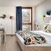 Teneo Apparthotel Bordeaux Maritime room with bed, dining table, desk and large window in Bordeaux