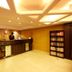 Hotel Waves, Delhi Airport lobby in New Delhi with front desk, hallway and brochure display