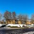 Days Inn by Wyndham London Stansted Airport in Bishop's Stortford, snowy exterior by road