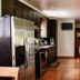 The Broadway Guest House in Granville: modern kitchen with stainless steel appliances and island seating