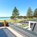 Pavilion Beachfront Apartments in Mount Maunganui balcony with ocean view and beach beyond
