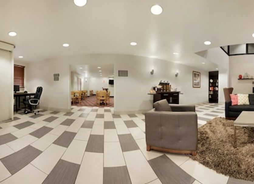 Country Inn & Suites By Radisson Dfw-Arpt S Irving lobby with seating area and check-in desk