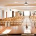 Thotel Lamezia in Feroleto Antico conference room with rows of chairs and presentation tables