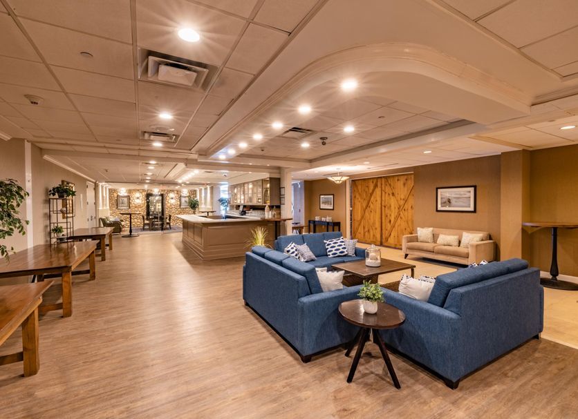 Holiday Inn Manahawkin/Long Beach Island lobby with blue seating and reception area