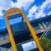 Premiere Classe Toulouse Ouest -Blagnac Aéroport exterior with bright yellow entrance sign in Blagnac