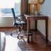 Royal Orchid Central Jaipur, Bani Park: desk, chair and window view in a guest room