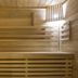 Anastazia Luxury Suites & Spa sauna interior in Diónysos with wood slat benches and warm lighting