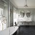 The Gleneagles Hotel, Auchterarder: elegant bathroom with freestanding tub, double vanity and dark tiled floor