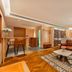James Joyce Coffetel Hotel Qinhuangdao lobby with leather sofa, lounge chairs and wood flooring