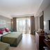 Seher Sun Palace Resort & Spa in Side guest room with twin beds and balcony view