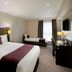 Premier Inn Glasgow - Cambuslang/M74 J2a room with double bed, single bed, desk and TV in Glasgow
