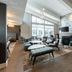 Residence Inn by Marriott Wilkes-Barre Arena lobby with fireplace, seating area, and tall windows in Wilkes-Barre