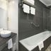 Rias Bajas Pontevedra bathroom with bathtub, shower, and vessel sink